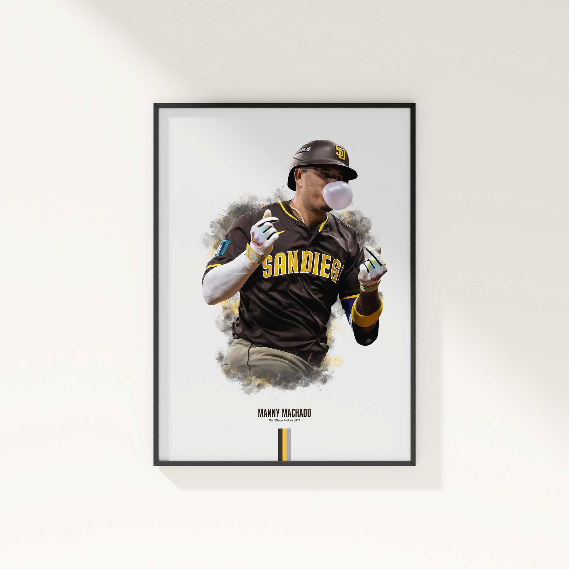 framed poster mockup of baseball player manny machado hanging on a white wall