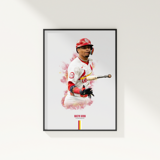 framed poster mockup of baseball player masyn winn hanging on a white wall