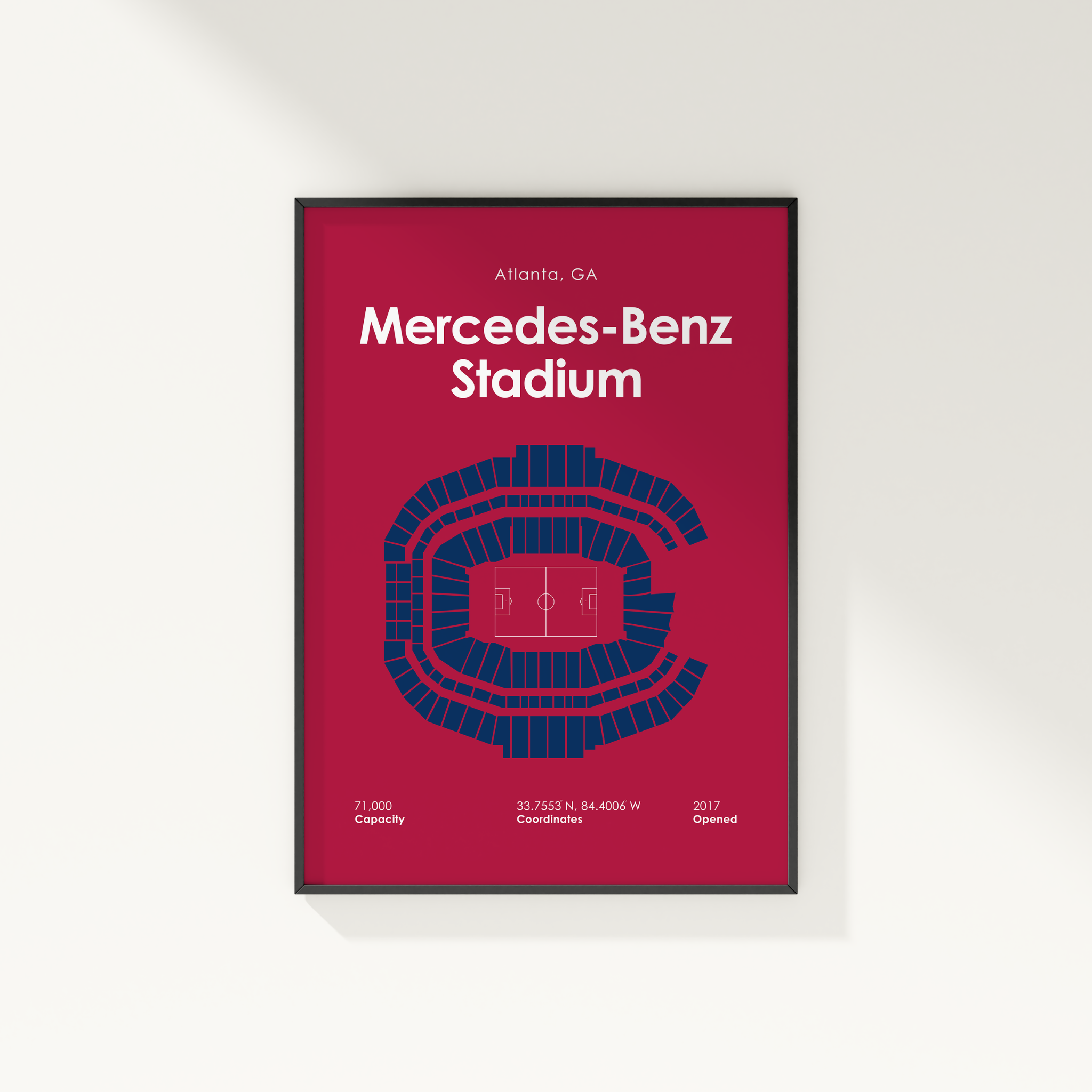 Framed poster of Mercedes-Benz Stadium with seating chart on a red background