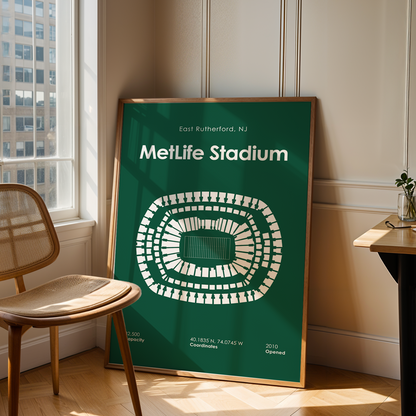 Framed poster of MetLife Stadium in a room with a chair and table.