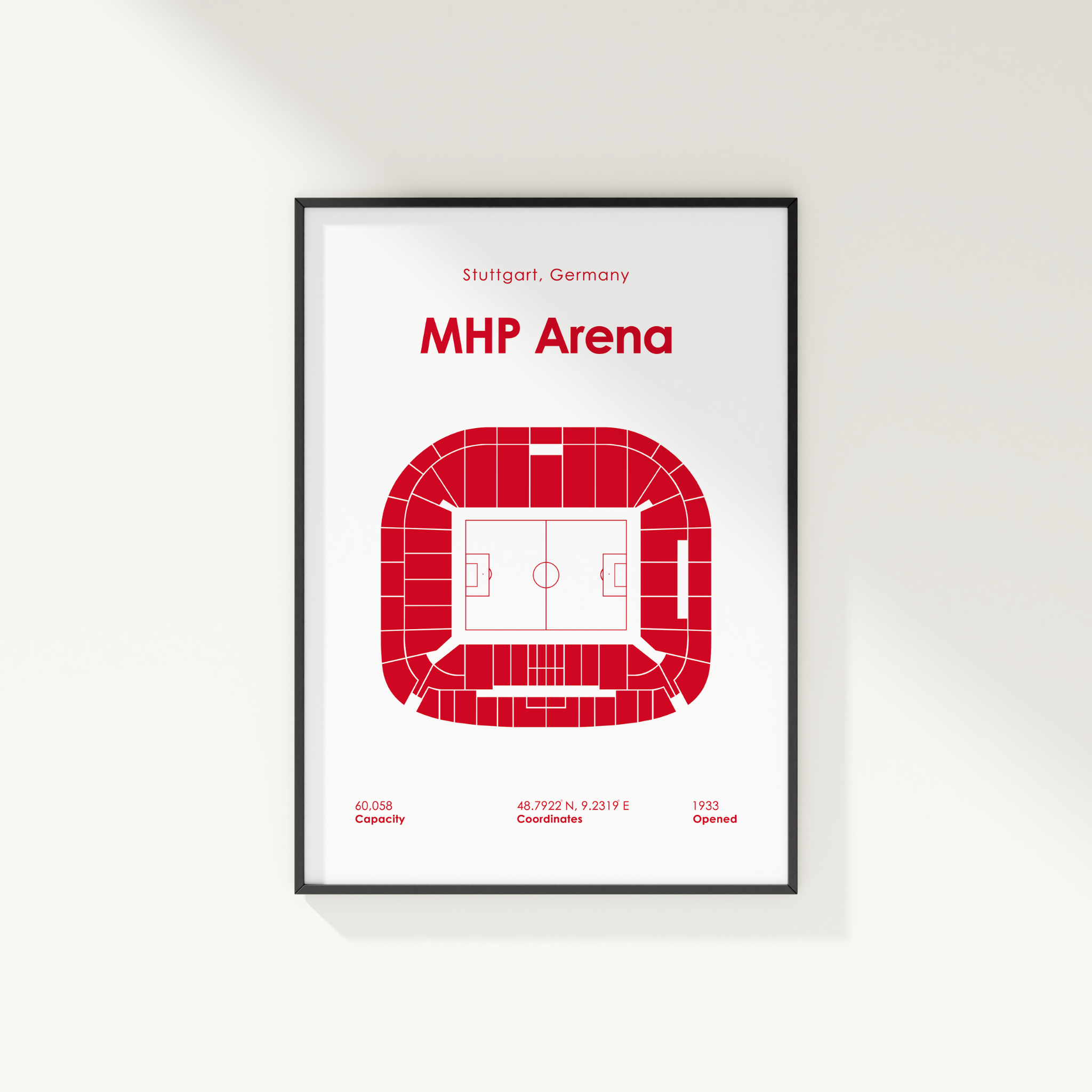 A framed minimalist stadium floor plan poster for MHP Arena in Stuttgart, Germany, featuring a red top-down seating diagram on a white background with a thin black frame.