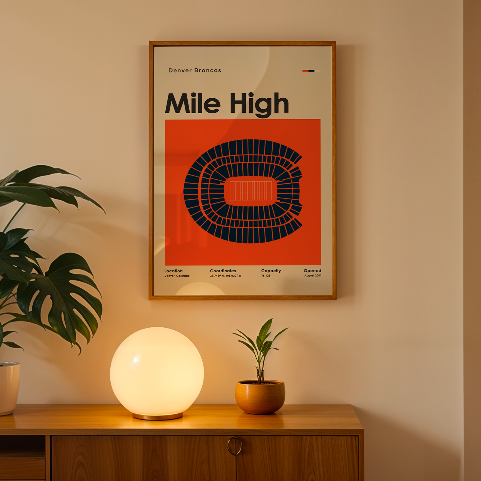 Framed 'Mile High' poster on a wall above a wooden cabinet with decorative items.
