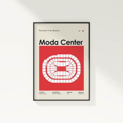 Framed poster of Moda Center with Portland Trail Blazers text on a white wall.