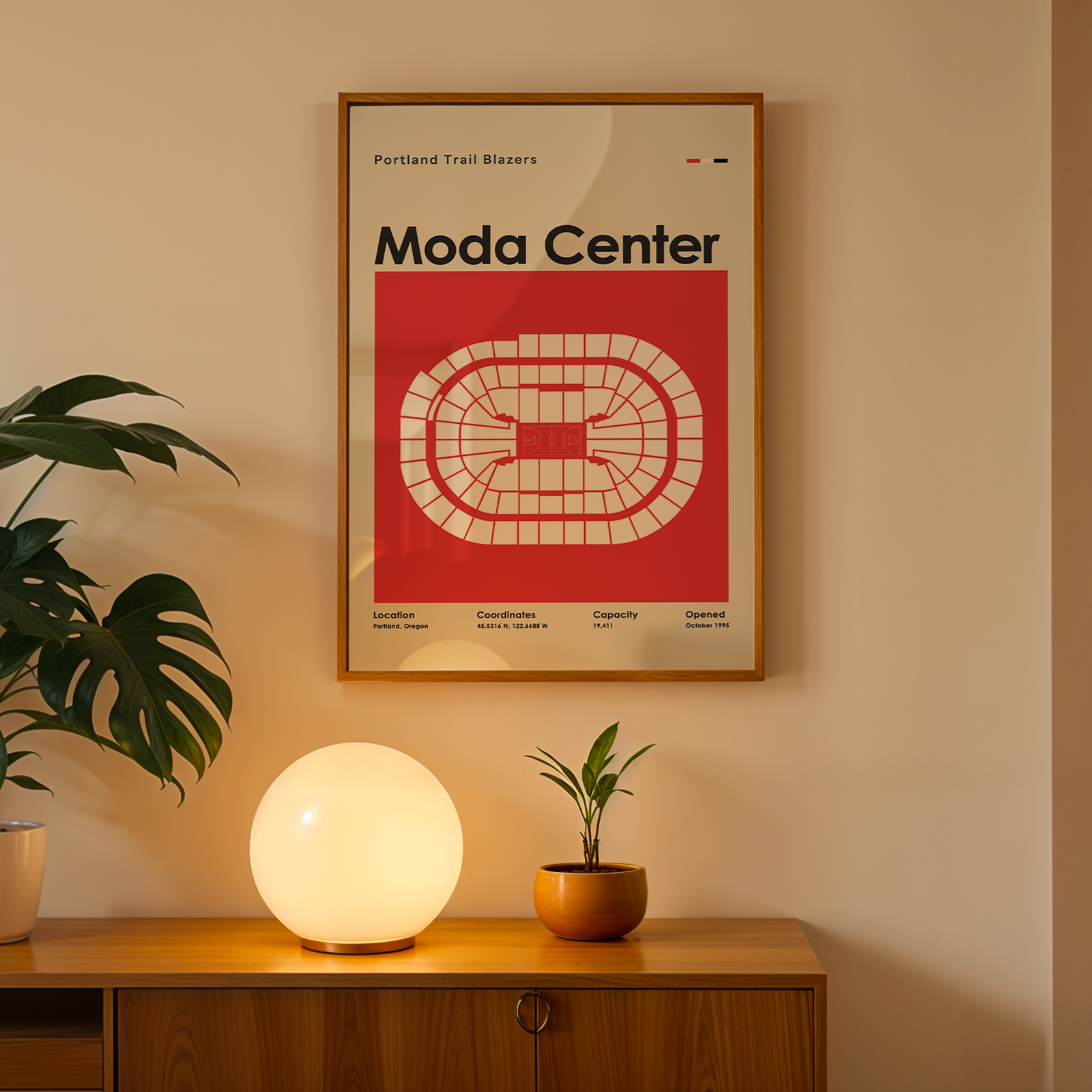 Framed poster on a wall above a wooden cabinet with decorative items.