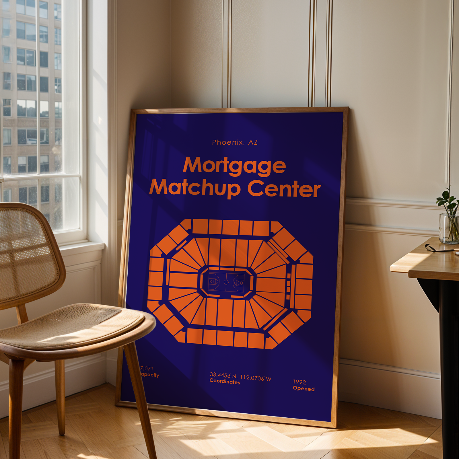 Framed poster of a 'Mortgage Matchup Center' with seating diagram in a room with a chair and table.