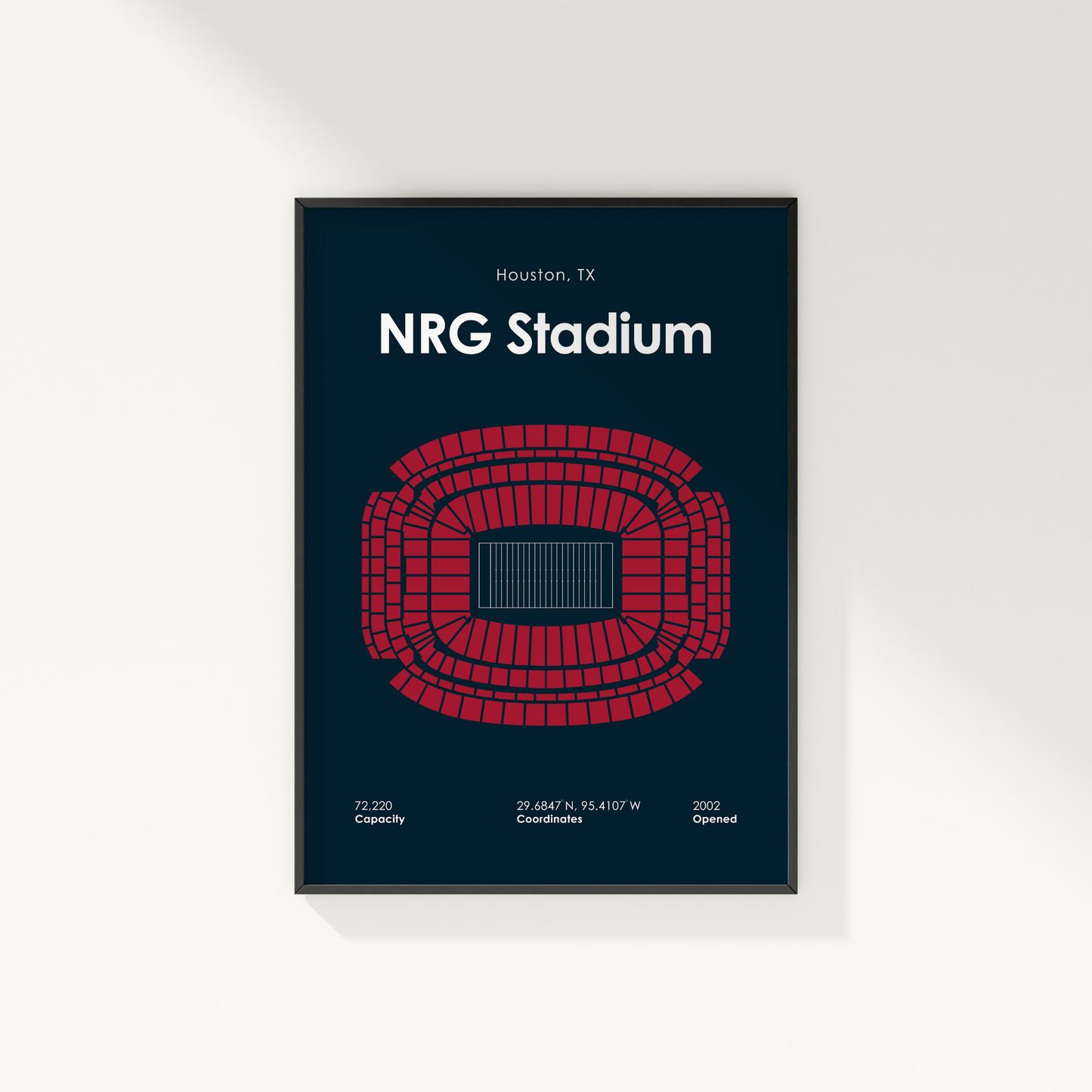 Framed poster of NRG Stadium layout with red seating pattern on a dark blue background.