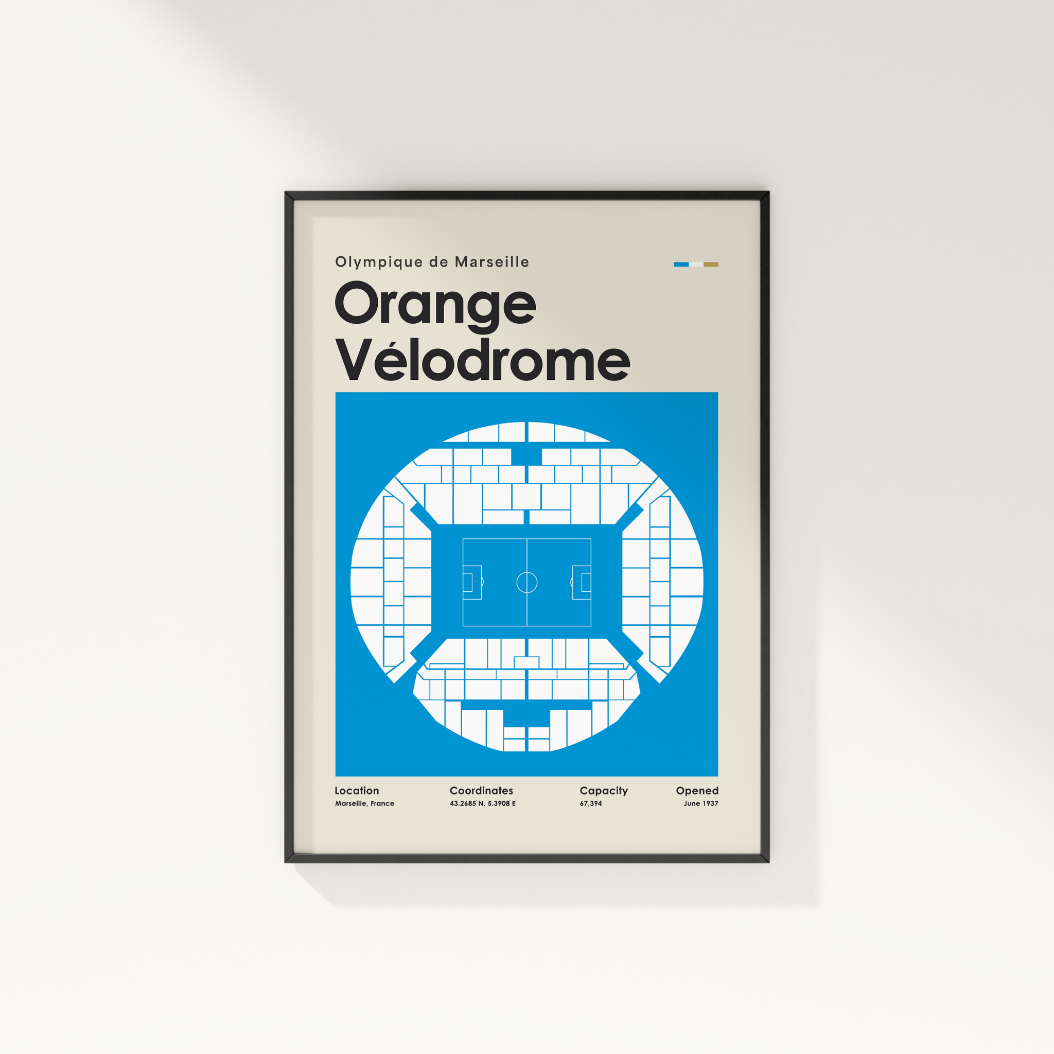 Framed poster of Orange Velodrome with blue and white design on a light gray background