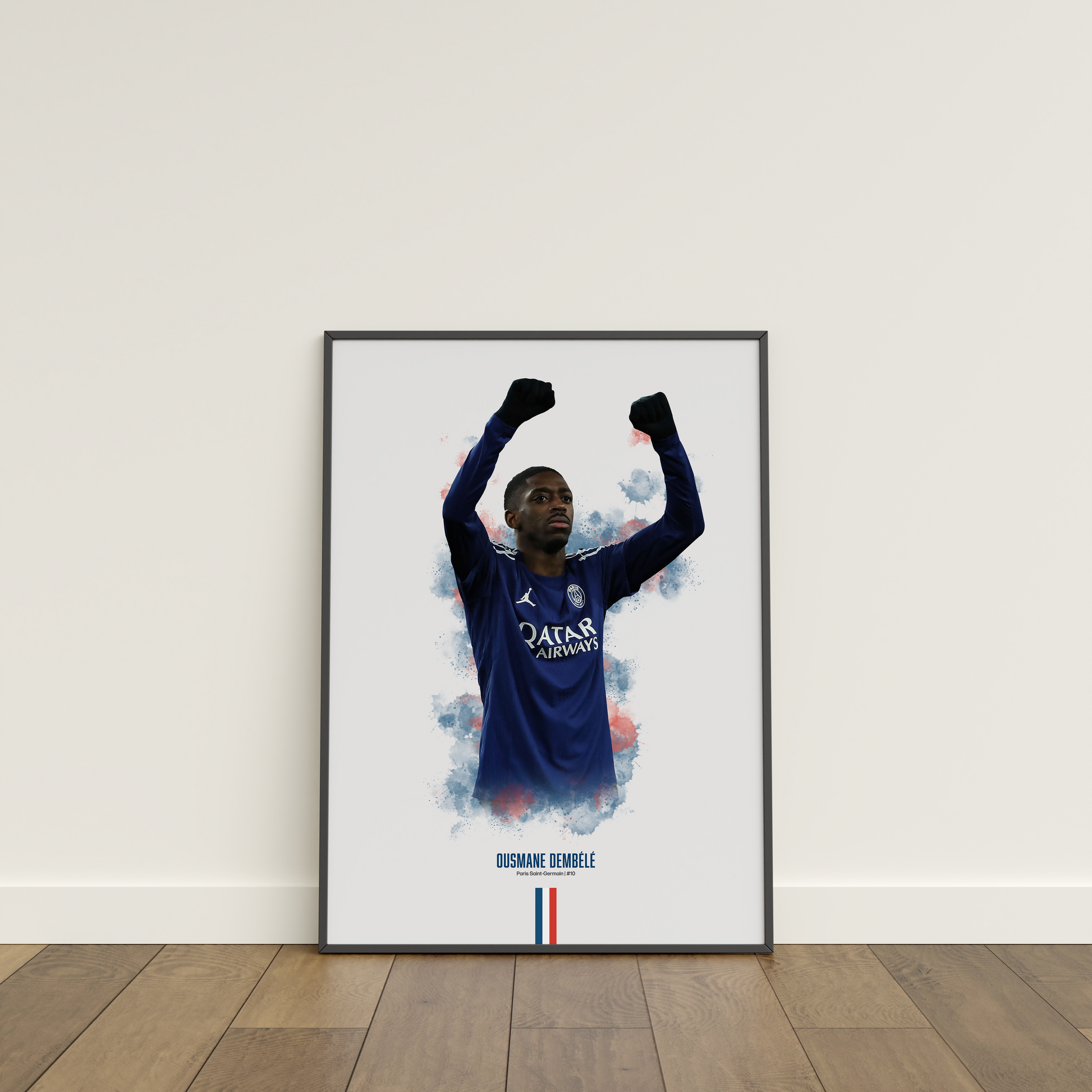 Framed poster print of soccer player Ousmane Dembele, wearing a PSG jersey, on a white wall.