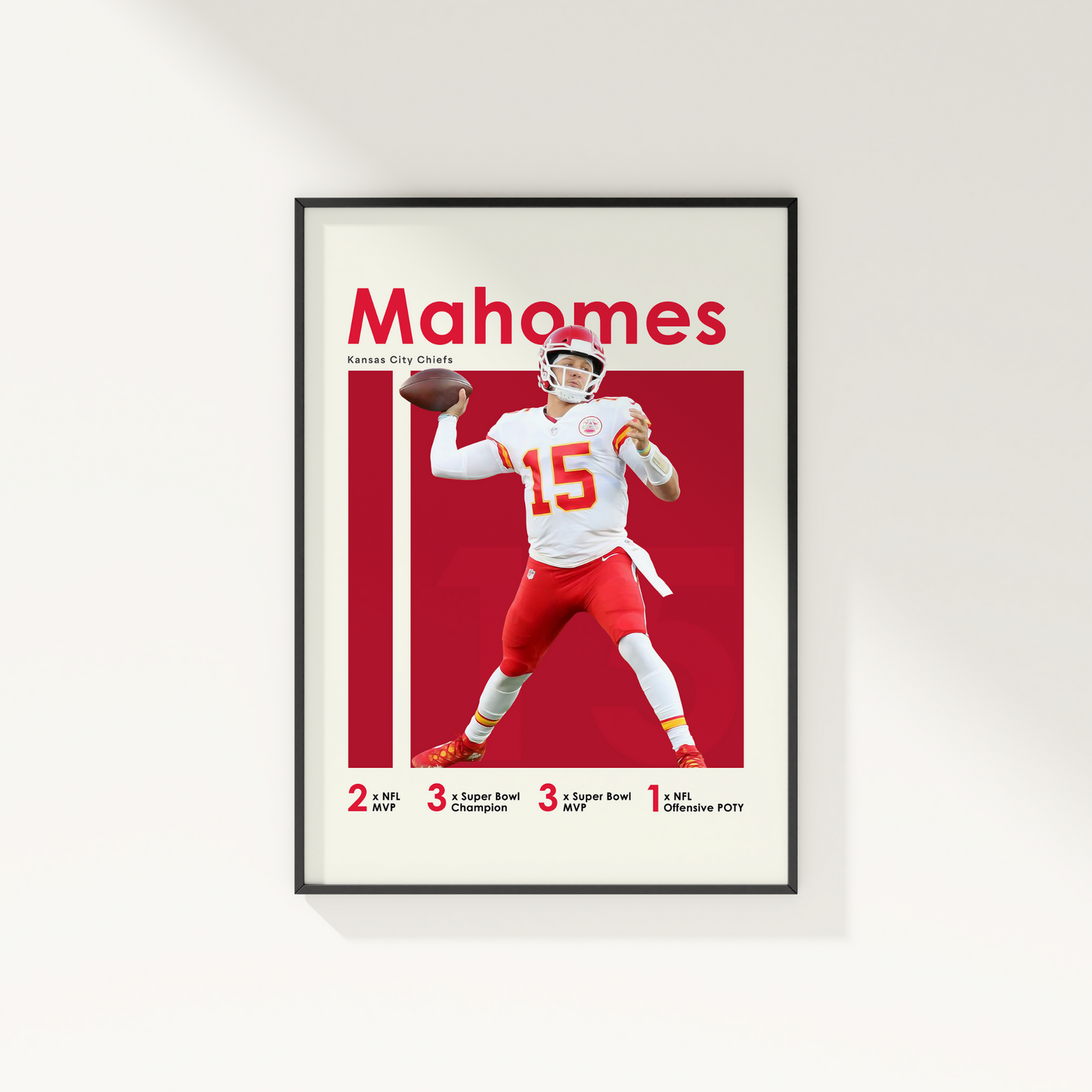 framed poster mockup of football player patrick mahomes hanging on a white wall