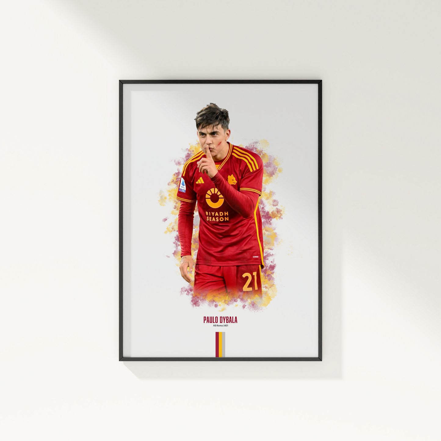 framed poster mockup of soccer player paulo dybala hanging on a white wall