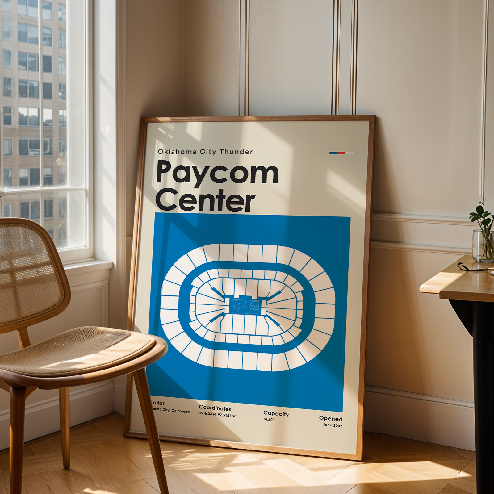 Poster of Paycom Center in a room with a chair and table