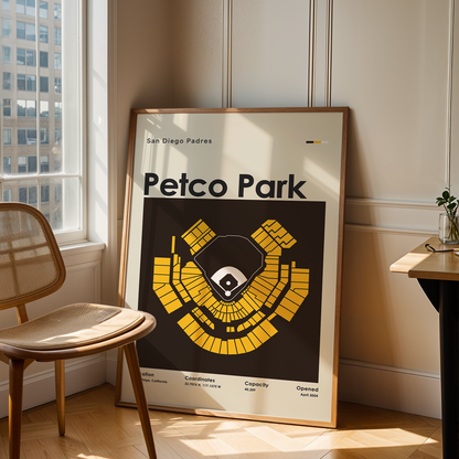 Framed Petco Park map poster in a room with a chair and table.