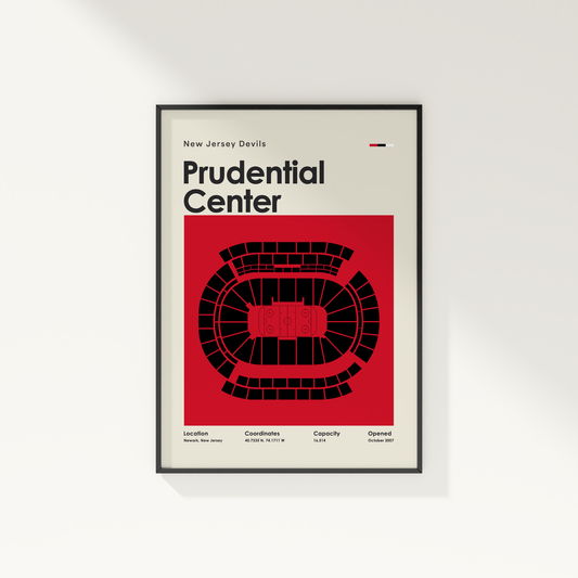 Framed poster of Prudential Center with red and black design on a white wall.
