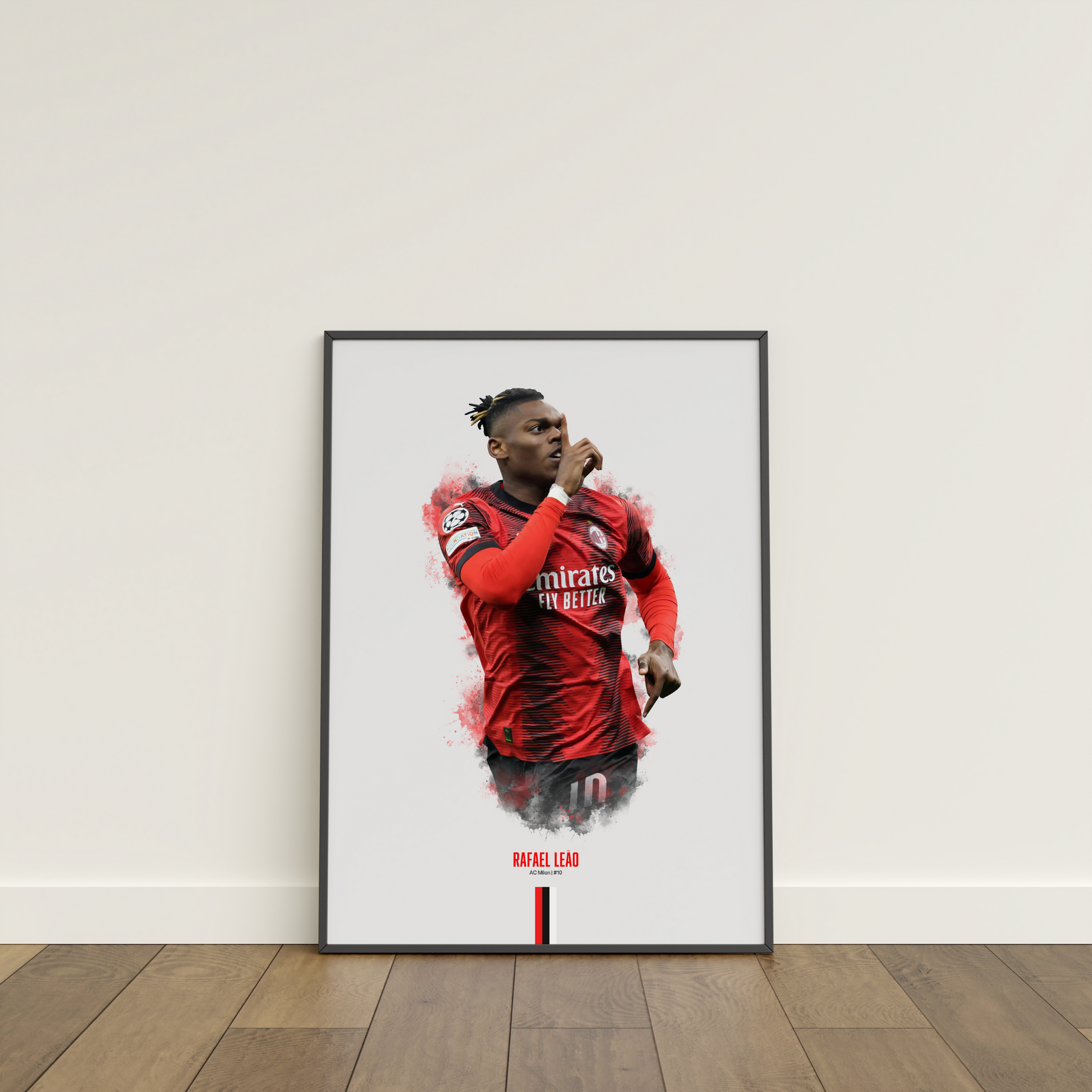 framed poster mockup of football player rafael leao leaning on a white wall