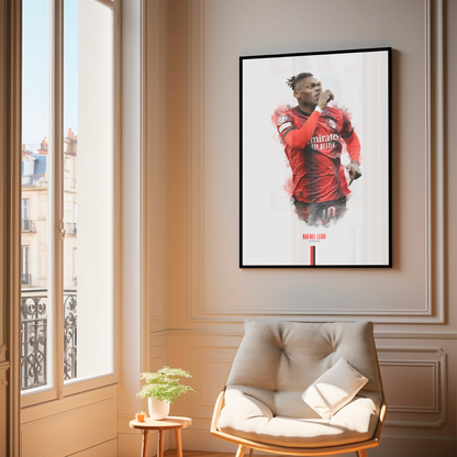 framed poster mockup of football player rafael leao hanging in a living room