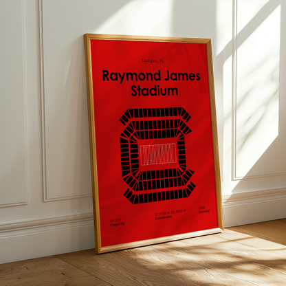 Poster of Raymond James Stadium in a gold frame on a white wall.