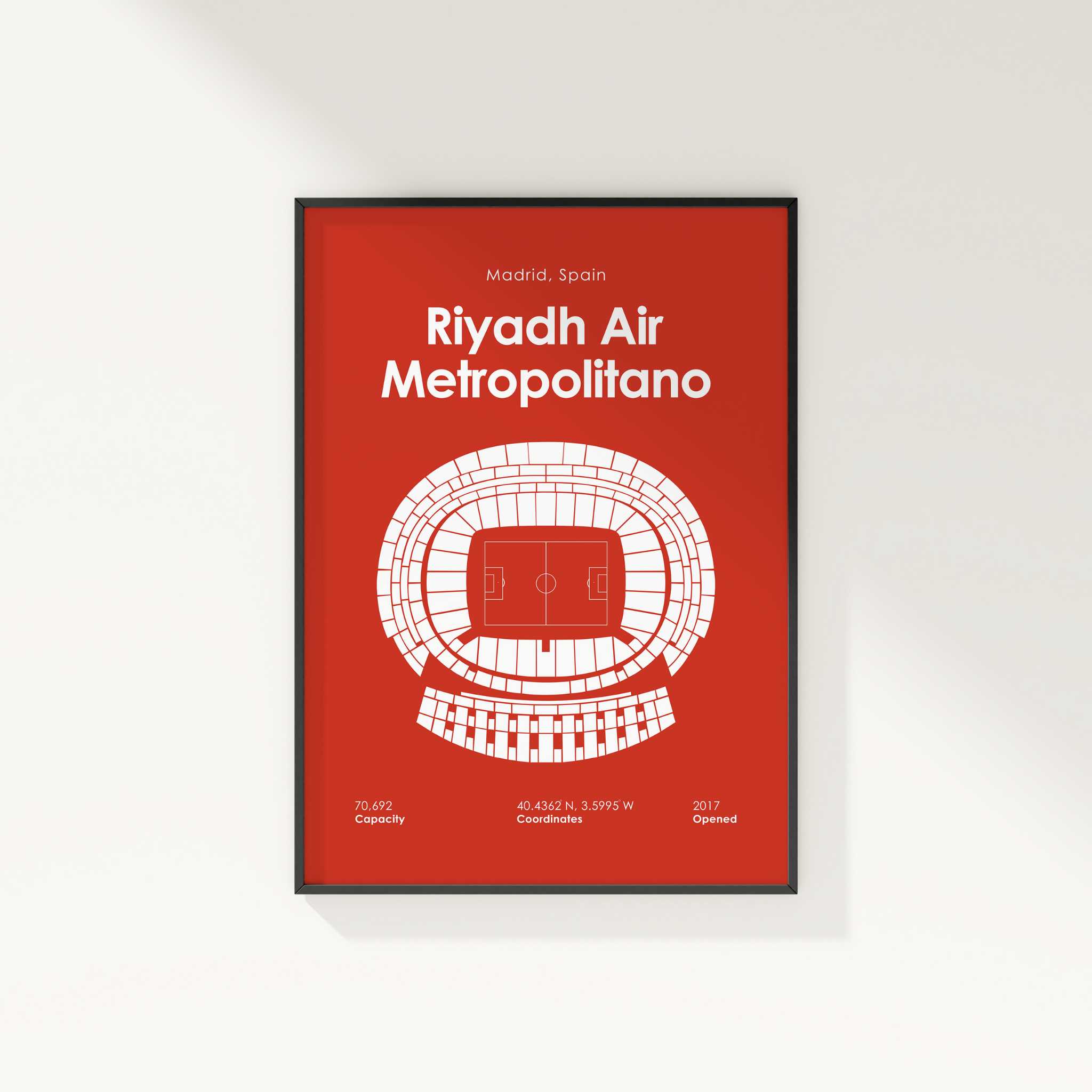 Framed poster of Riyadh Air Metropolitano with red background and white text