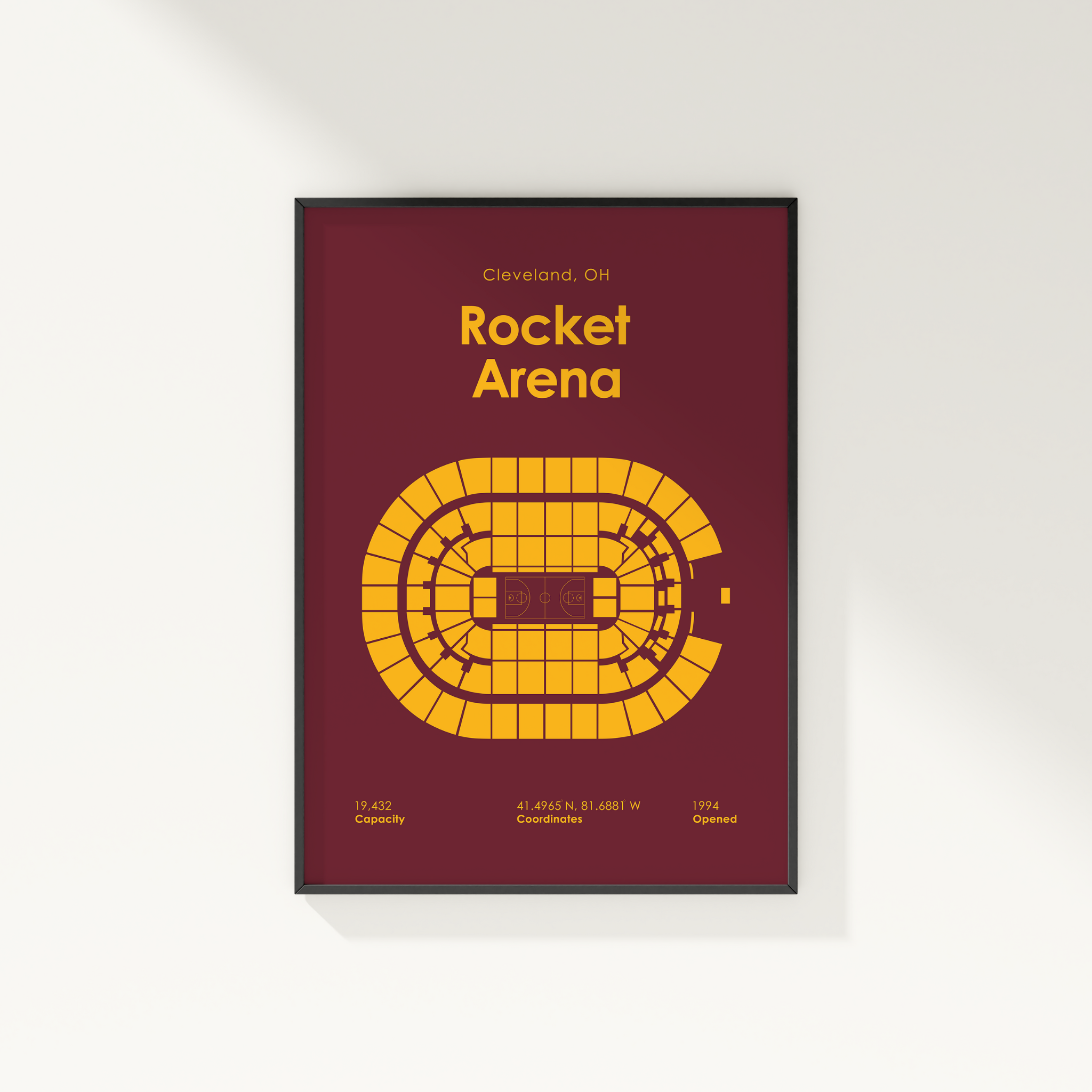 Framed poster of Rocket Arena layout with maroon background and yellow design