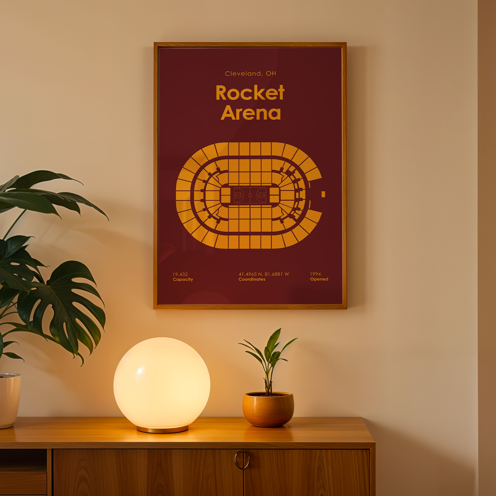 Framed poster of Rocket Arena on a wall above a wooden cabinet with decorative items.