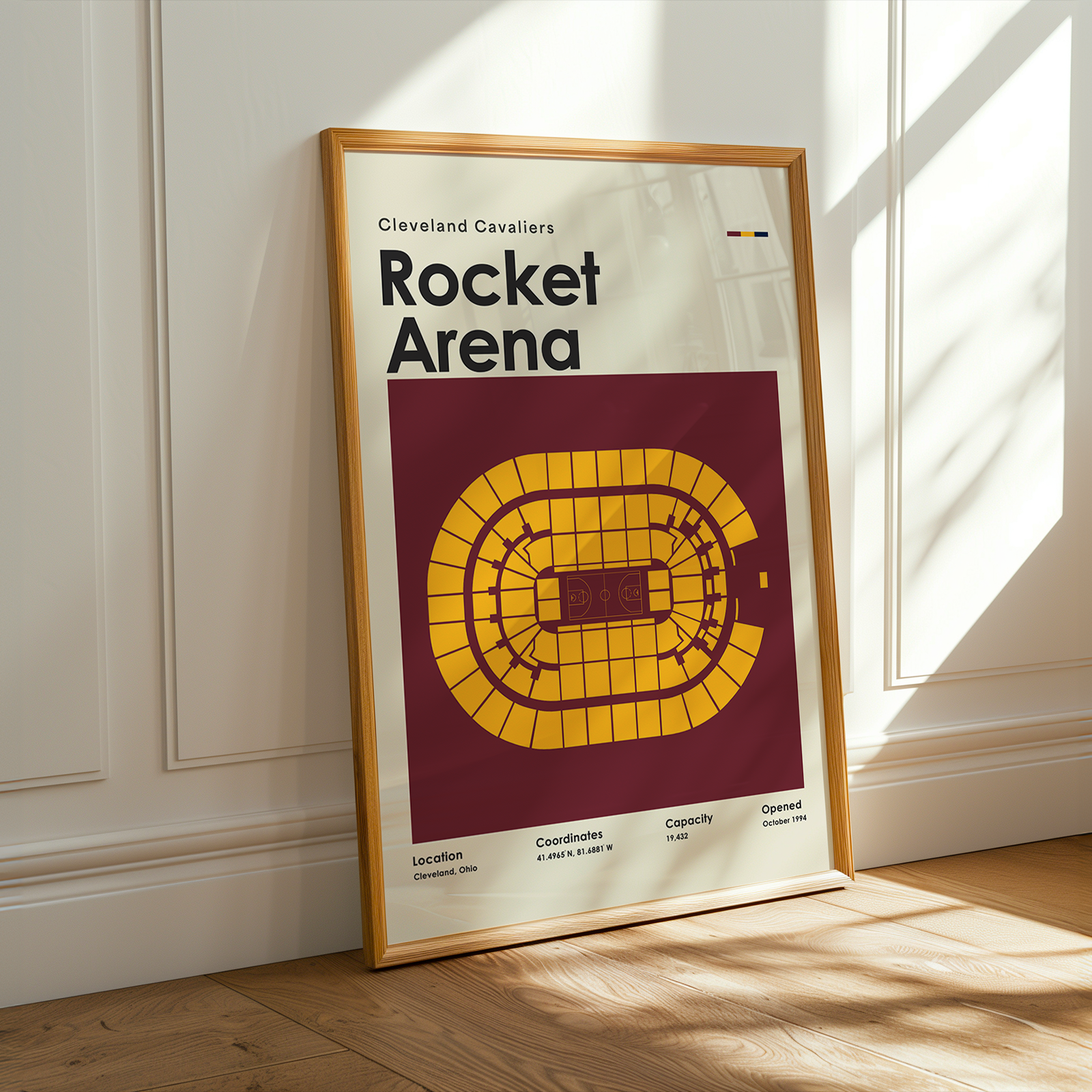 Framed poster of Rocket Arena with Cleveland Cavaliers branding on a wall.