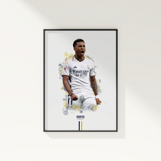 framed poster mockup of soccer player rodrygo hanging on a white wall