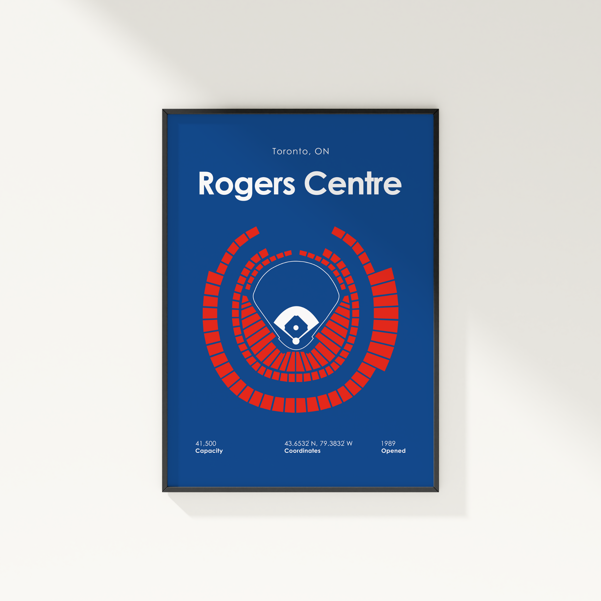 Framed poster of Rogers Centre with blue background and red circular design.