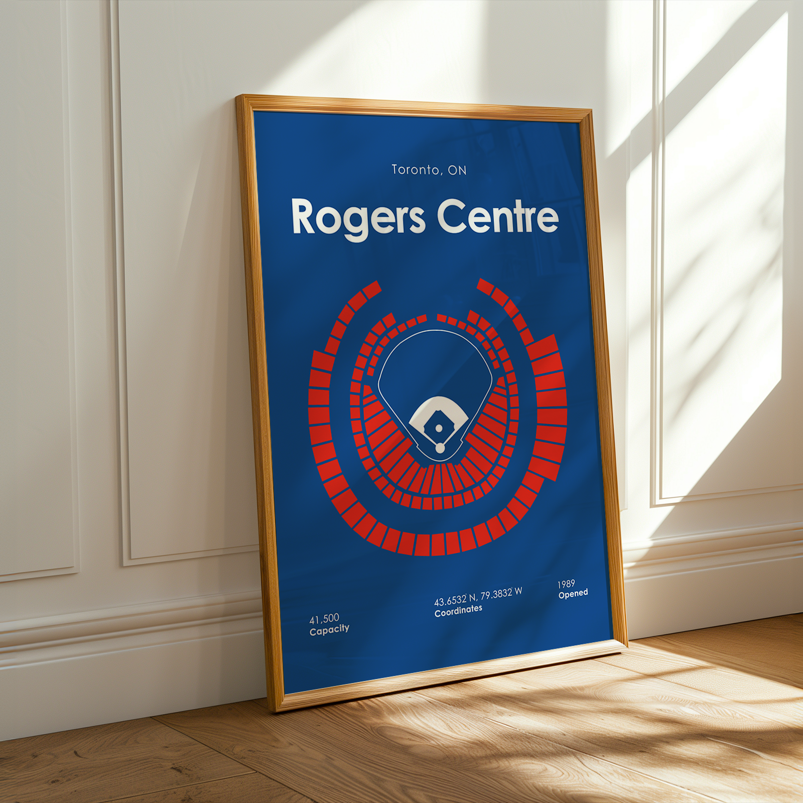 Framed poster of Rogers Centre in Toronto, ON on a wall.