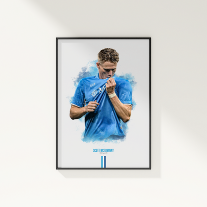 Framed poster print of soccer player Scott McTominay, wearing a Napoli jersey, on a white wall.