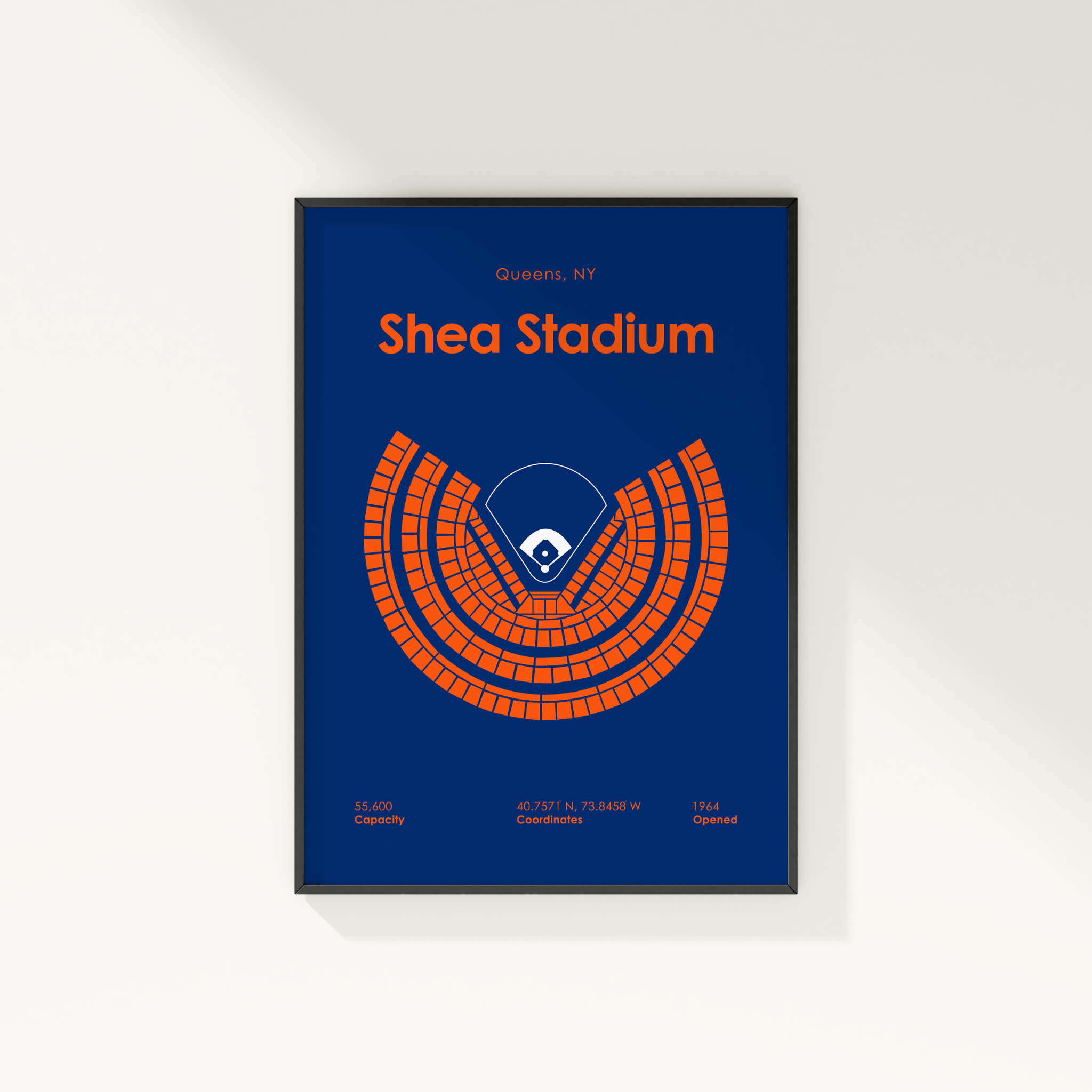 Shea Stadium poster with blue background and orange seating layout on a white wall