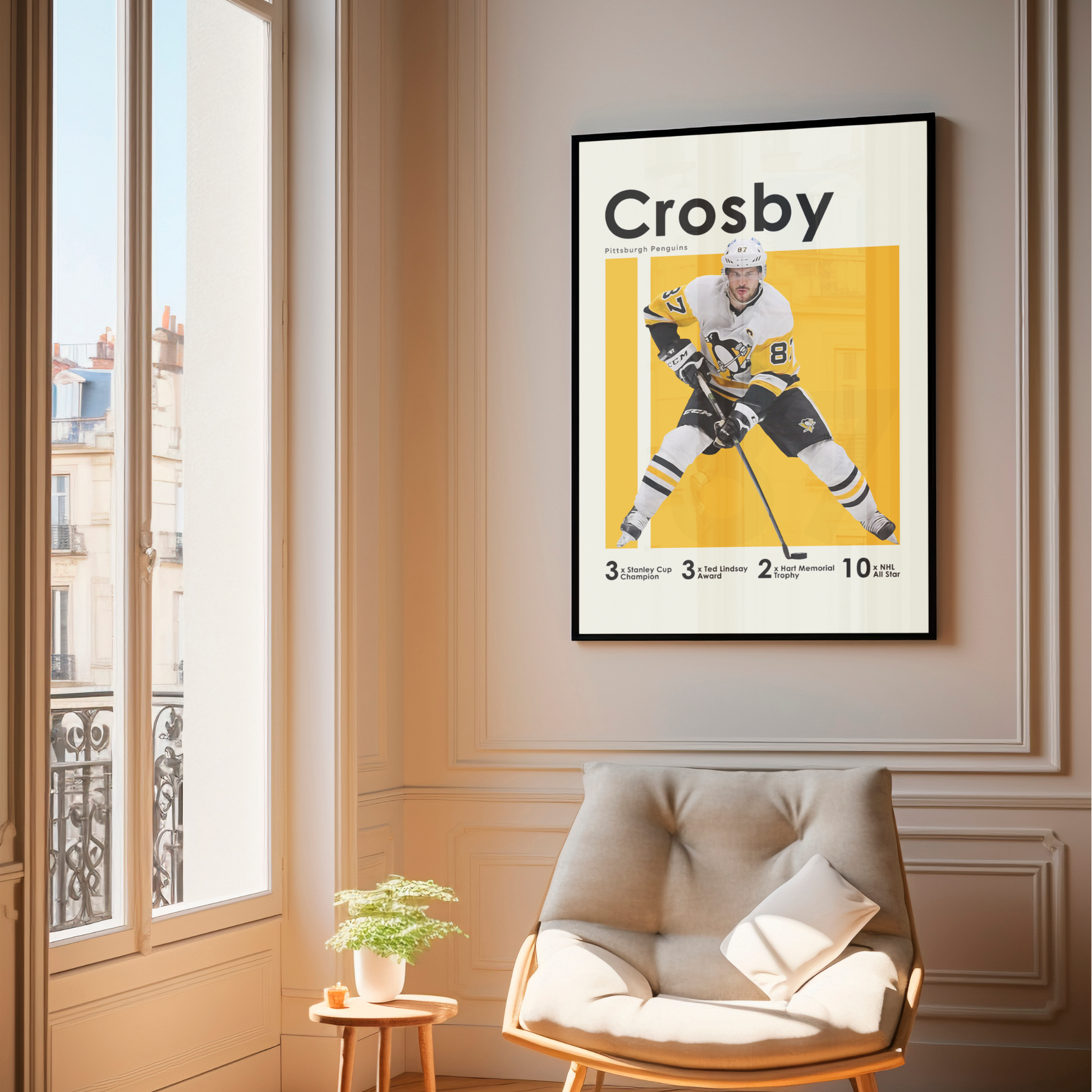 framed poster mockup of hockey player sidney crosby hanging in a living room