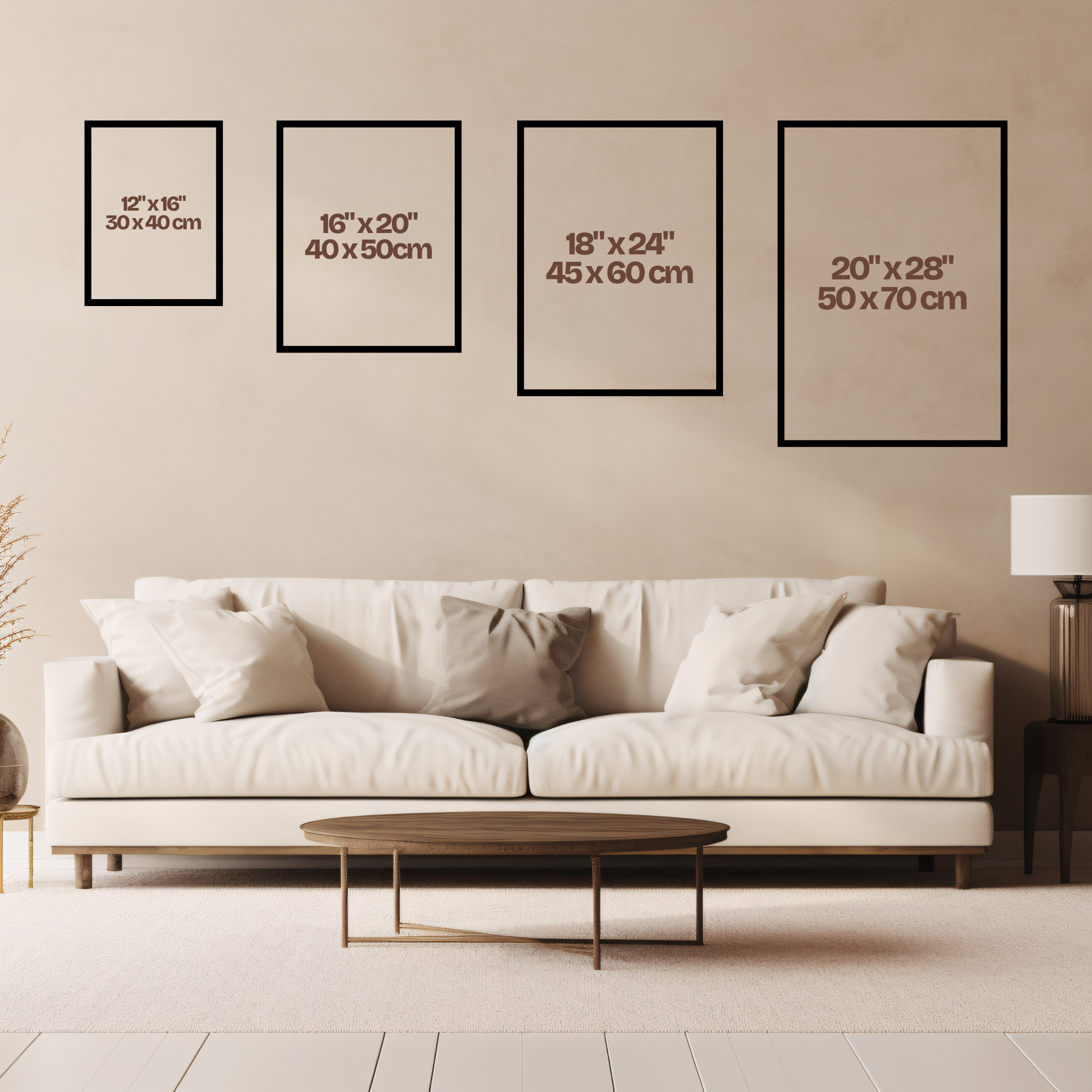 Living room with a white sofa and wall art frames displaying sizes.