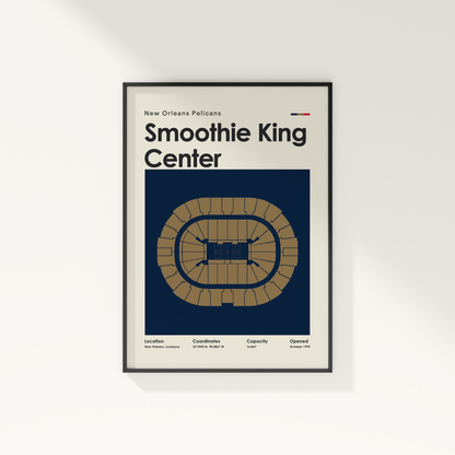 Framed poster of Smoothie King Center with New Orleans Pelicans text on a white wall.