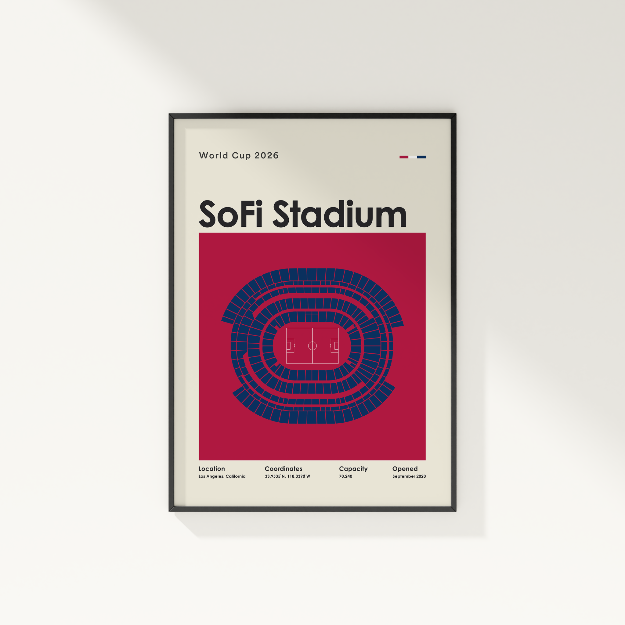 Framed poster of SoFi Stadium for World Cup 2026 on a white wall.