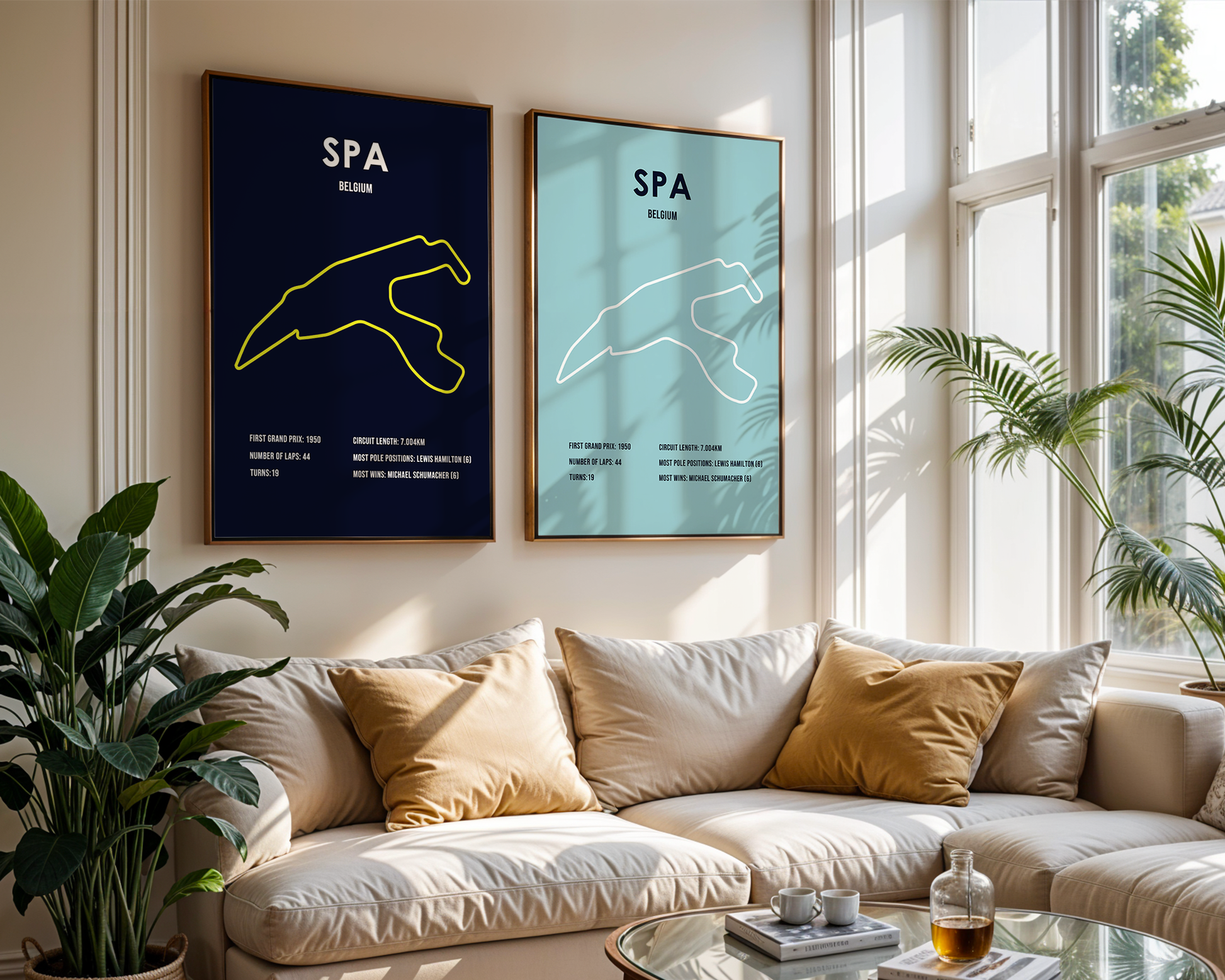 Living room with a beige sofa, decorative pillows, and two framed posters on the wall.