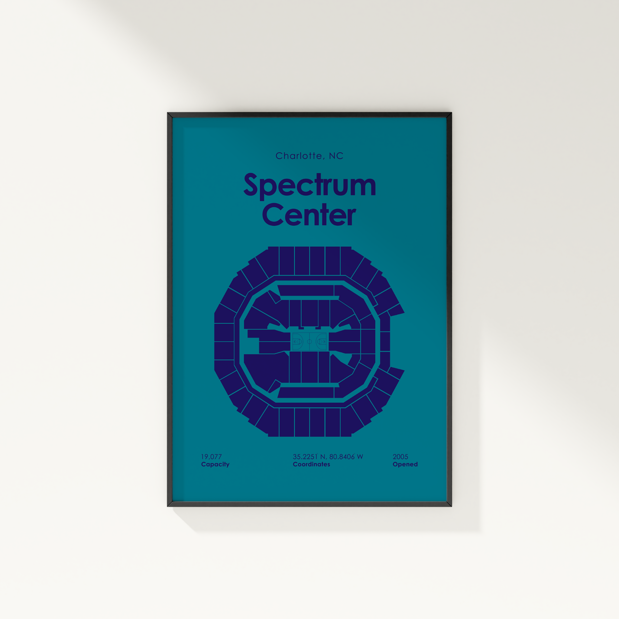 Framed poster of the Spectrum Center layout on a blue background