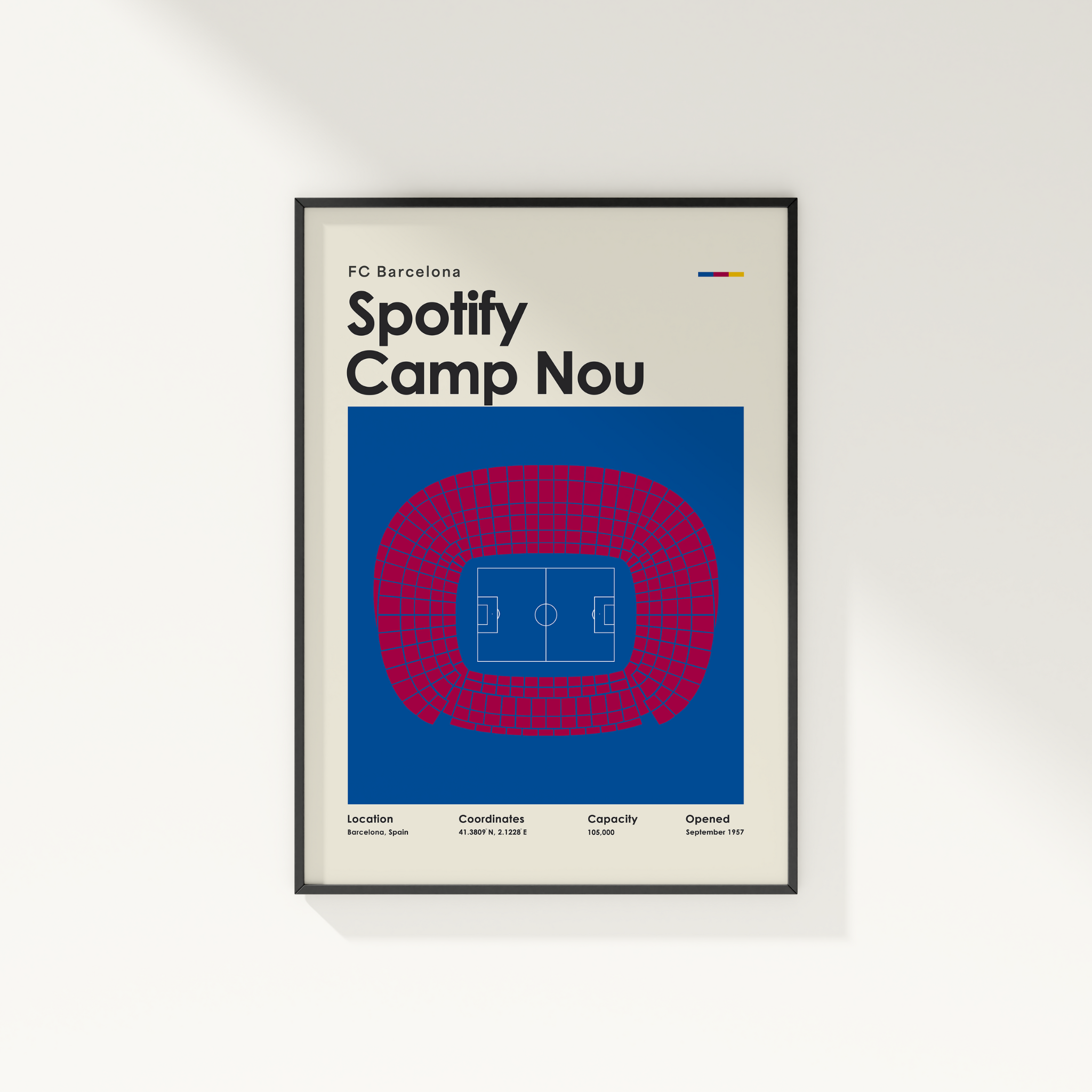 Framed poster of FC Barcelona's Spotify Camp Nou stadium layout on a white wall.