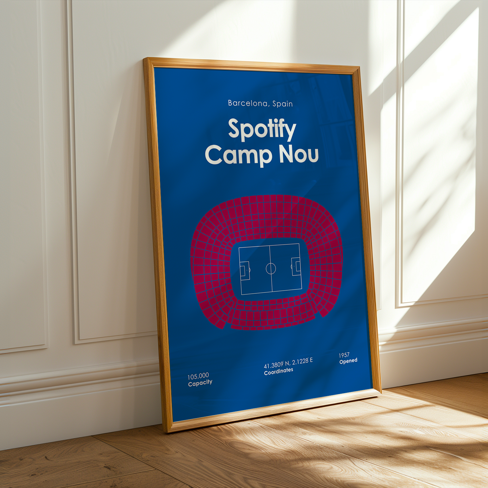Framed poster of Spotify Camp Nou stadium layout on a wall.