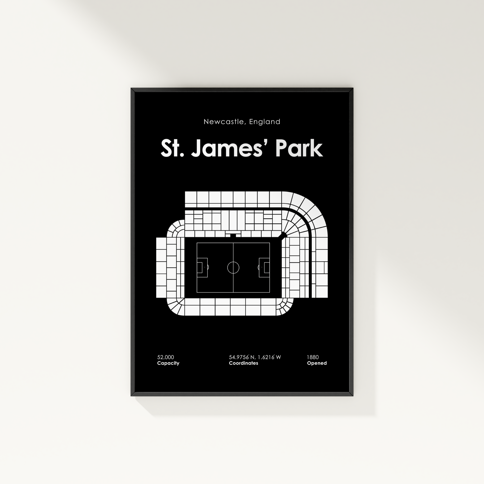 Framed poster of St. James' Park stadium layout on a black background