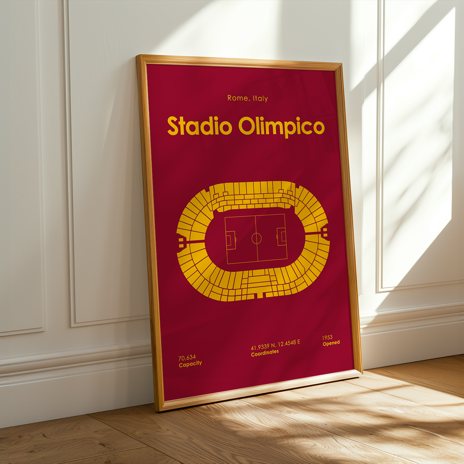 Framed poster of Stadio Olimpico on a wall with sunlight casting shadows.