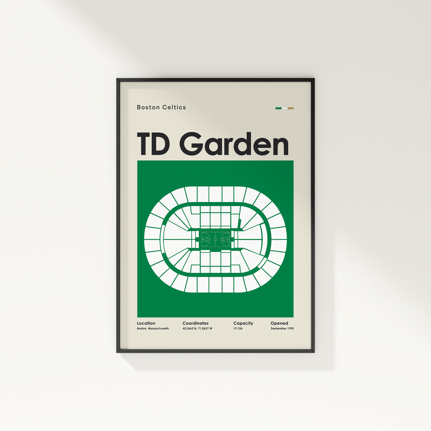 Framed poster of TD Garden layout with Boston Celtics branding on a white wall.