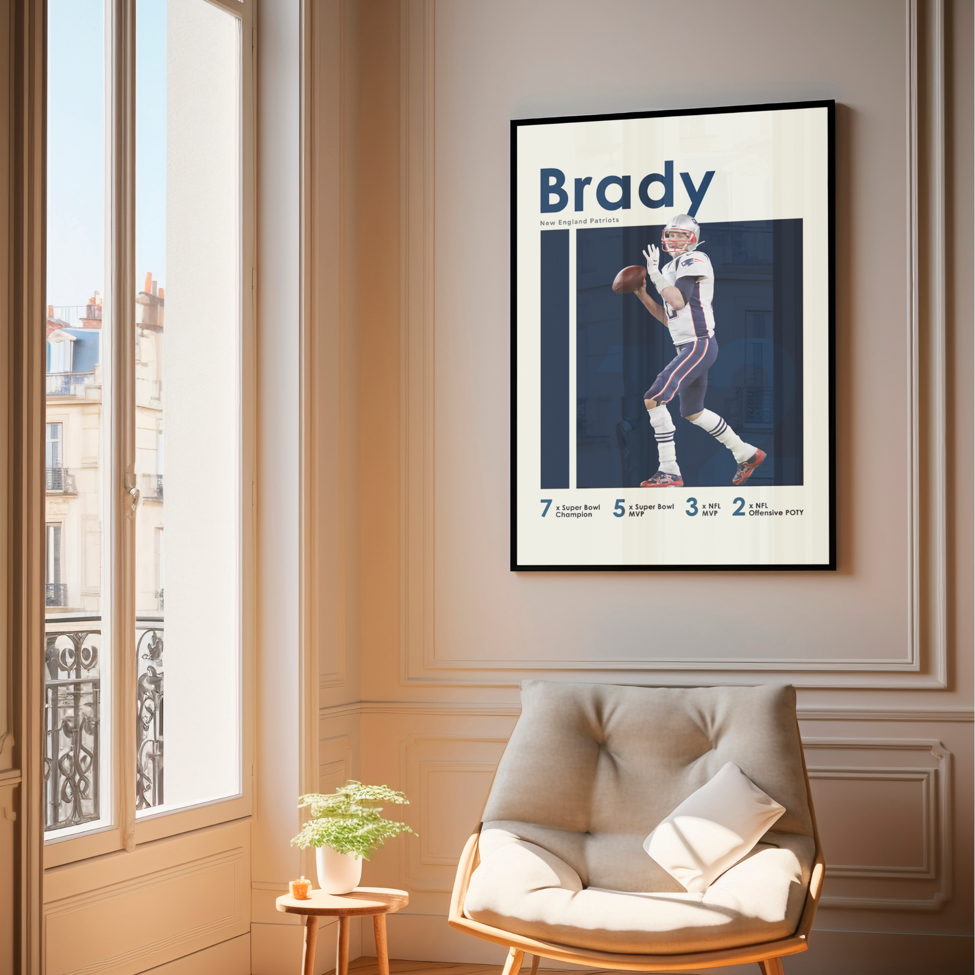 framed poster mockup of football player tom brady hanging in a living room