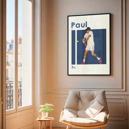 framed poster mockup of tennis player tommy paul hanging in a living room