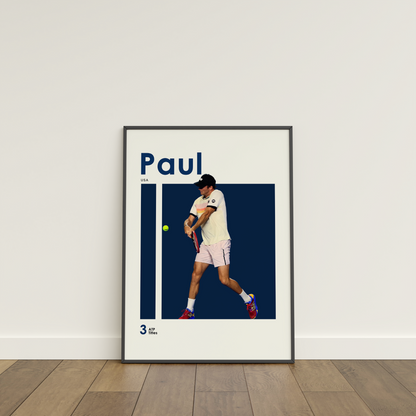 framed poster mockup of tennis player tommy paul leaning on a white wall