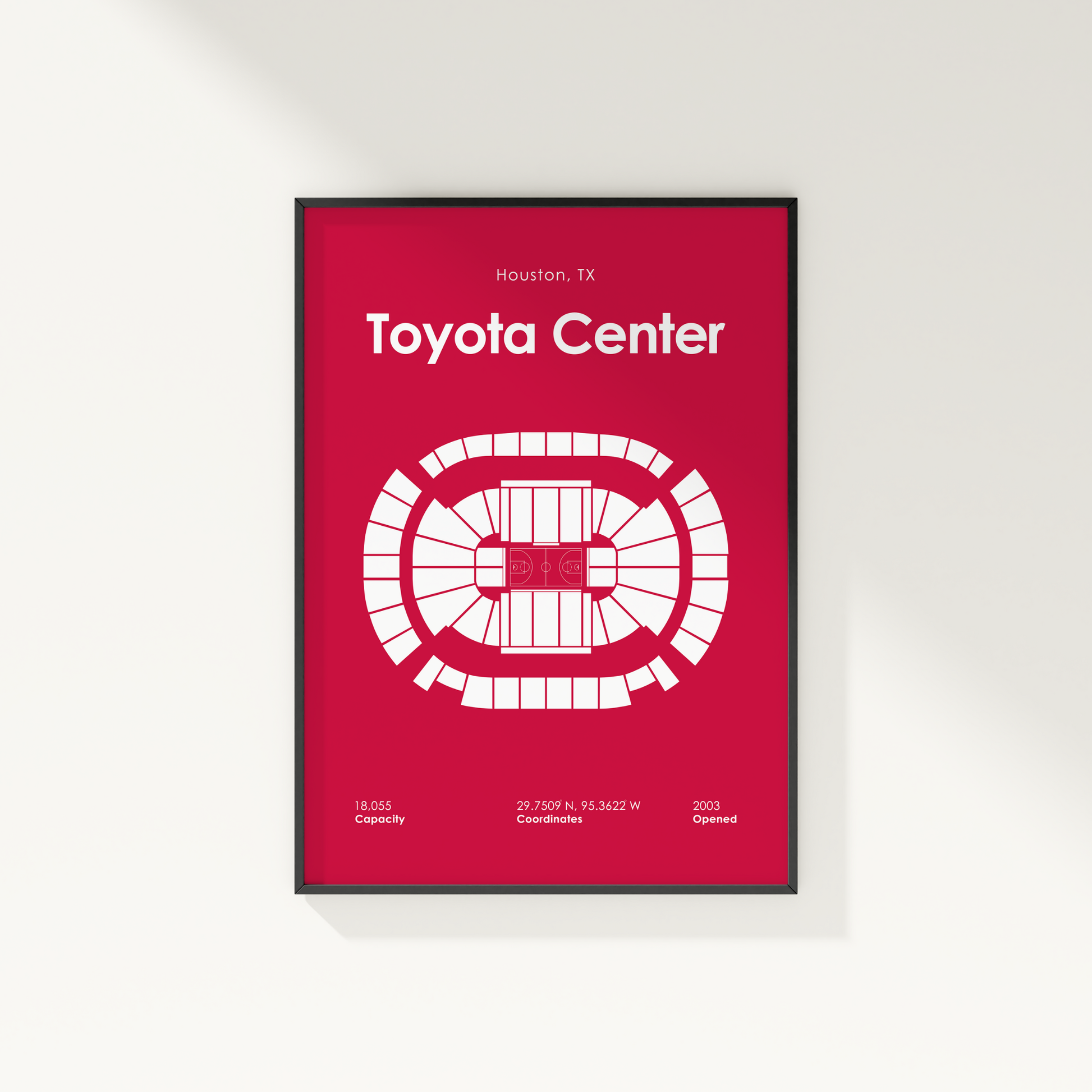 Framed poster of Toyota Center with red background and white text