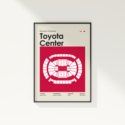 Framed poster of Toyota Center with Houston Rockets branding on a white wall.