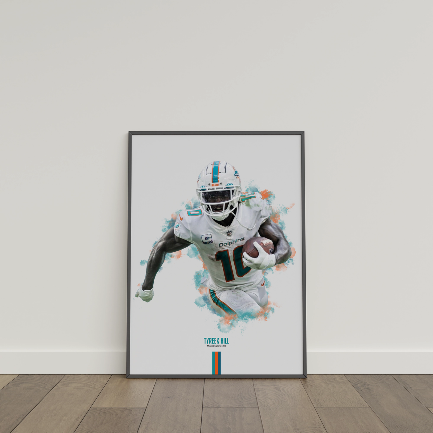 framed poster mockup of football player tyreek hill leaning on a white wall