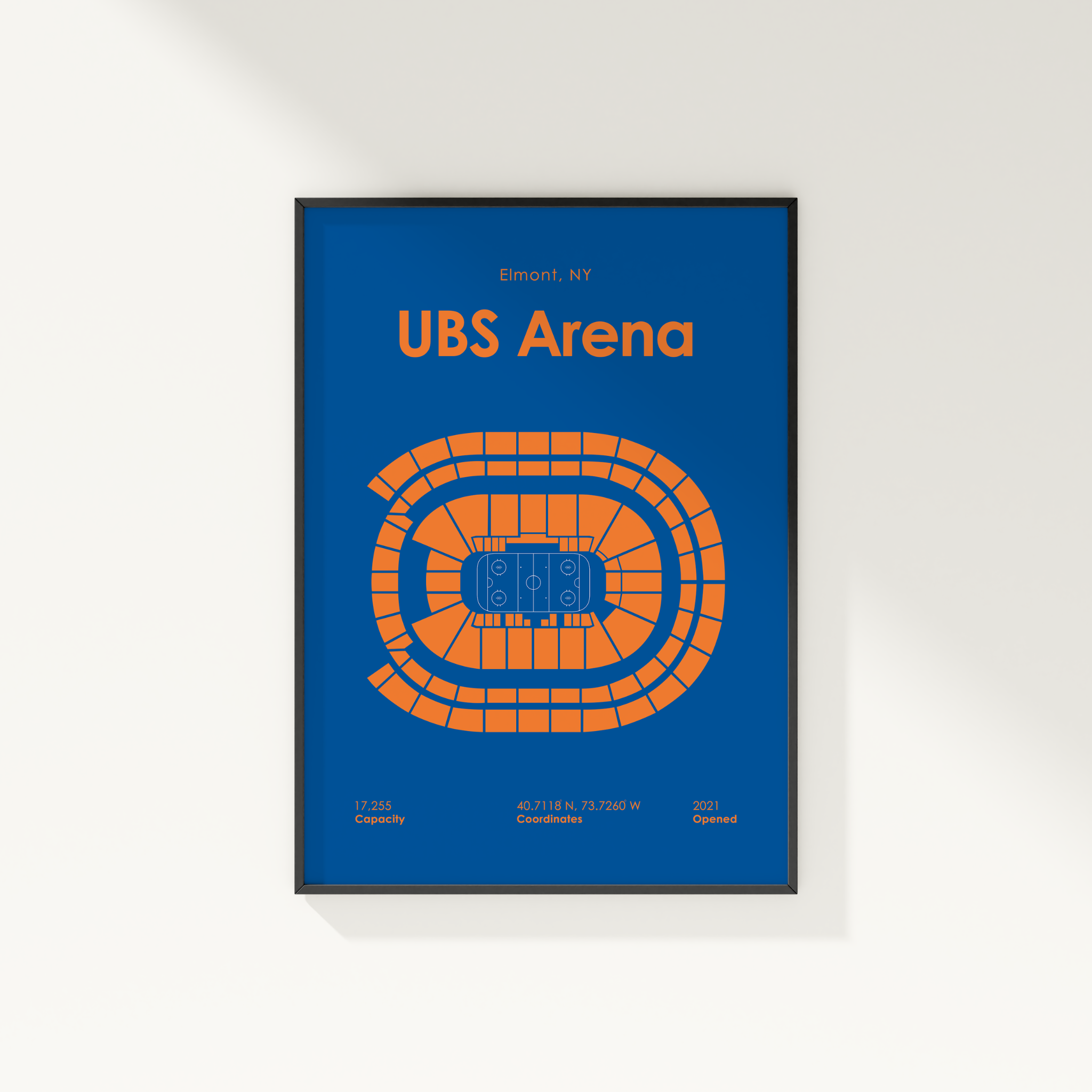 Framed poster of UBS Arena with blue background and orange seating chart