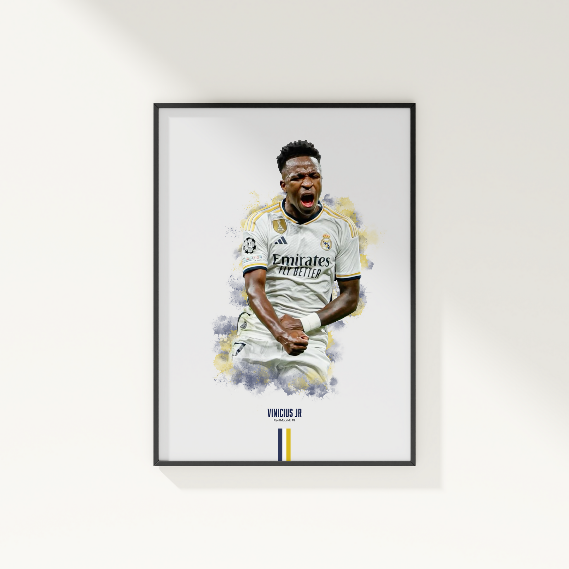 framed poster mockup of soccer player vinicius jr hanging on a white wall